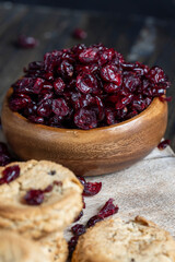 delicious dried cookies made of high-quality flour with dried red cranberries on the table