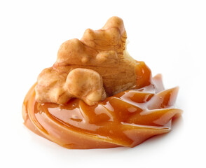 walnut in melted caramel cream