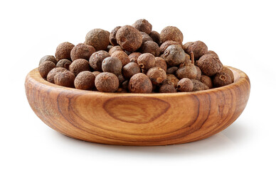 aromatic black pepper in olive wood bowl