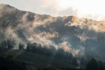 sunrise with fog in the mountains after a rainy night