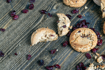delicious dried cookies made of high-quality flour with dried red cranberries on the table