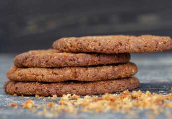 delicious crispy cookies broken into pieces with crumbs