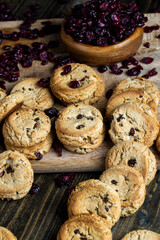 delicious dried cookies made of high-quality flour with dried red cranberries on the table