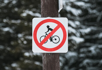 No Bicycles Allowed Sign. A real photo of a road sign forbids cycling.