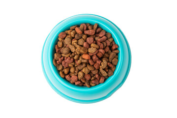 Dry food for cats and dogs in a red bowl on a white background, top view	