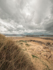View across the Firth of forth, Edinburgh, Scotland. The tide is out and the famous forth rail...