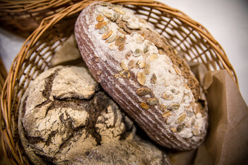 Obraz premium Fresh bread with grains and seeds. Fresh bakery.