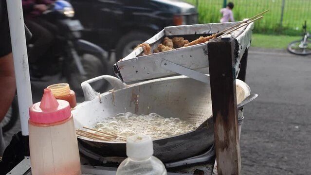 Cilor is a typical Indonesian street food made from starch, fried on a bamboo skewer and seasoned with spices