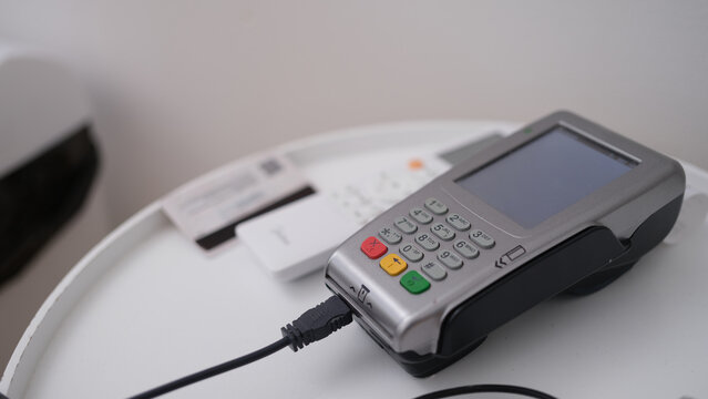 Credit card and payment terminal card reader closeup