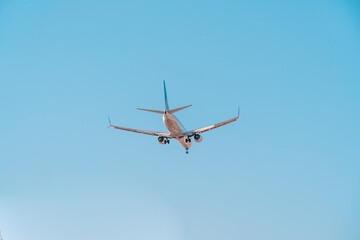 Airliner in blue sky. Travel, air transportation concept