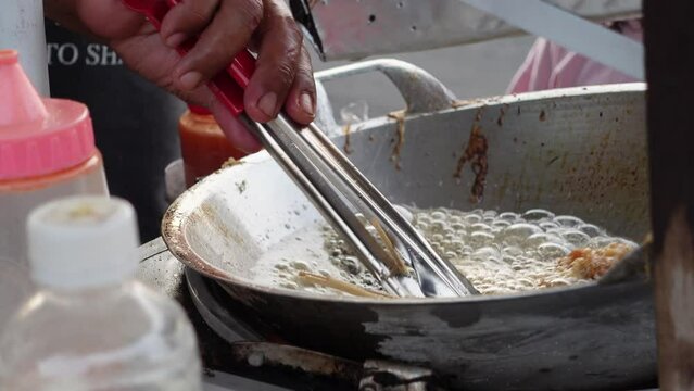 Cilor is a typical Indonesian street food made from starch, fried on a bamboo skewer and seasoned with spices