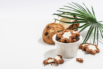 Gluten-free and lactose-free coconut cookies. Homemade healthy pastries, green tea, sunny morning