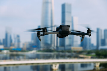 Flying drone in modern city