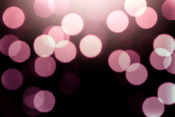 Defocused pink lights on a black background.