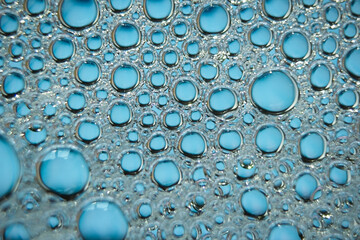 Abstract blue soap bubbles background