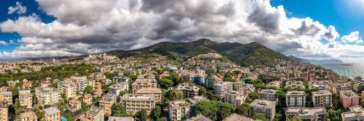 Fototapeta na wymiar Panoramic view of Genova on a cloudy day, Italy