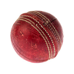 Old red leather cricket ball isolated against a white background