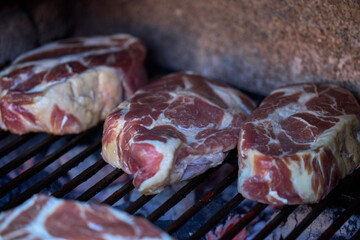 various pieces of grilled meat, grilled food.