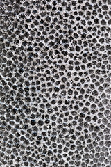 Abstract background from black and white styrofoam ball texture. Polystyrene material packaging.