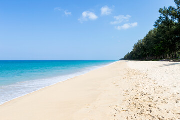 Clean sandy beach with beautiful blue sea, tropical island in south of Thailand, summer holiday destination