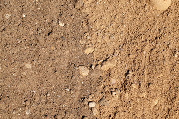 sand with stones on the construction site during the construction