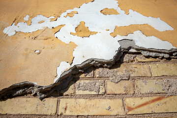a part of the wall of a building made of bricks