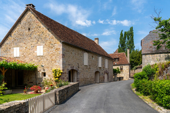 historic farm houses in the village center of Curemonte in the Perigord region of France