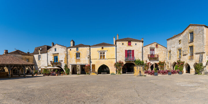 panorama view of the Place des Cornieres Square in the historic city center of Monpazier