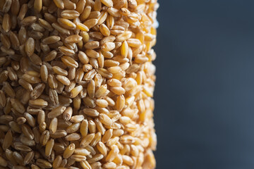 wheat grain bar closeup over dark background