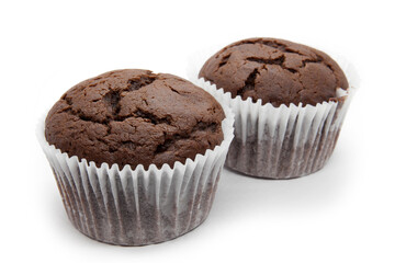 Two chocolate muffins with napkin on the white background