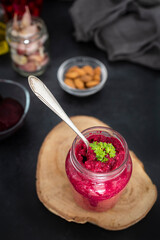 Beet pesto with garlic, lemon, basil, almond, tahini and salt. Delicious homemade beetroot pesto