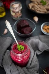Beet pesto with garlic, lemon, basil, almond, tahini and salt. Delicious homemade beetroot pesto