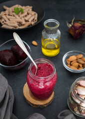 Beet pesto with garlic, lemon, basil, almond, tahini and salt. Delicious homemade beetroot pesto