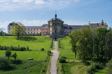 Fototapeta na wymiar Baroque building of Kuks Hospital on sunny summer day, former spa and chateau