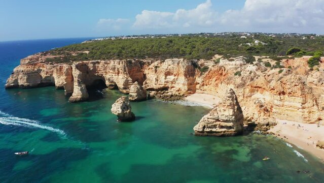 Aerial shot of the hidden beaches along the south coast of Algarve, Portugal