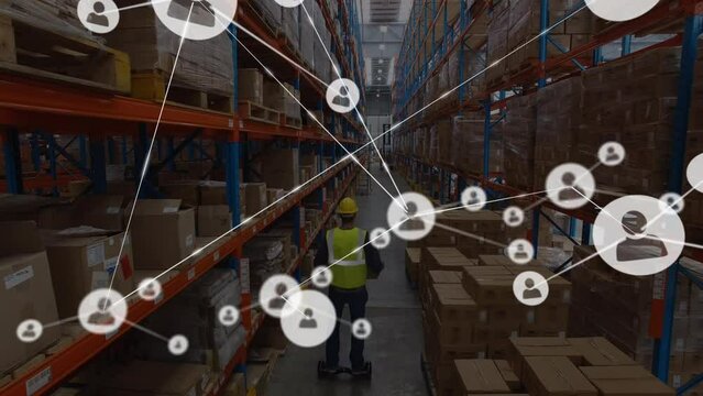 Animation of network of connections over caucasian worker in warehouse