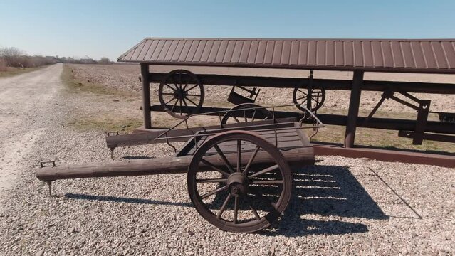 Old wooden cart slow motion in a village camera movement