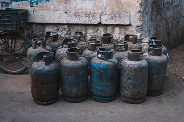 Naklejka premium Many old, used propane gas bottles