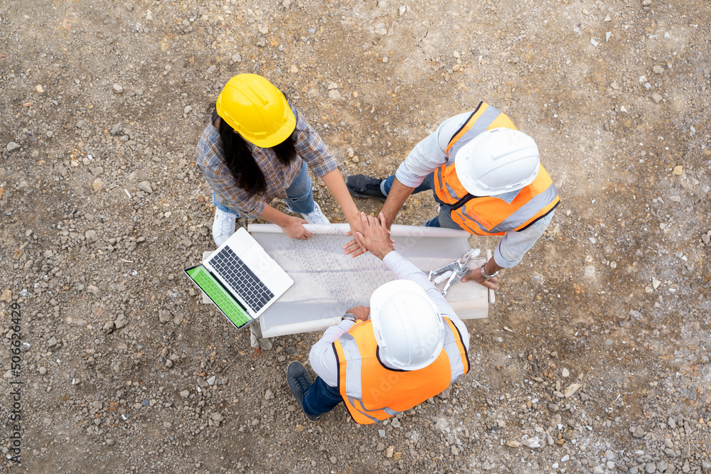 Aufkleber Architect,Foreman and worker discussing in building construction site in construction site,Construction residential new house in progress at building site.
