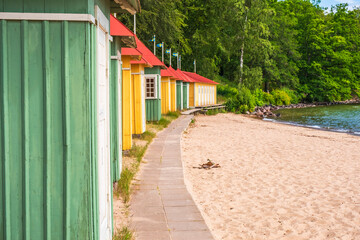 Idyllic cabins on a sand beach