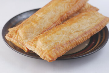  slice of apple pie cake on a plate on white 
