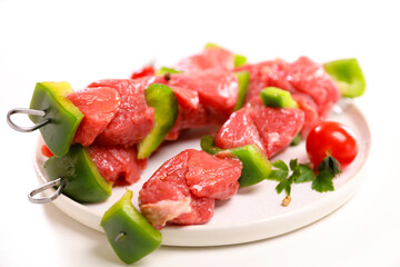 raw barbecue beef skewer on white background