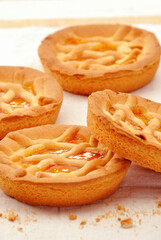 fresh baked peach pie cookies on kitchen table.