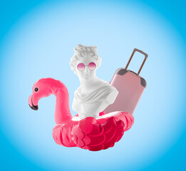 Collage of statue head, inflatable flamingo, pink glasses and suitcase on  blue background. Summer travel poster concept.