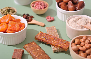 Fruit berry and nut energy bars. Healthy snack. protein bars with seedes. protein paleo vegan snack and ingredients.