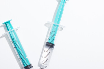 syringe with a drop of blood