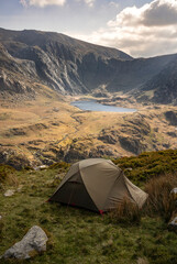 A wild camping tent in the mountains of Snowdonia in Wales UK