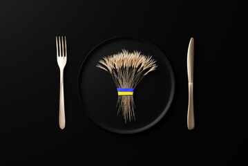 a sheaf of wheat on a black plate tied with the flag of ukraine. golden knife and fork, 3d rendering. concept of hunger and supply problems due to crisis and war
