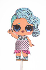 Decorate the topper on the cake. Children's girl's birthday celebration