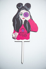 Decorate the topper on the cake. Children's girl's birthday celebration